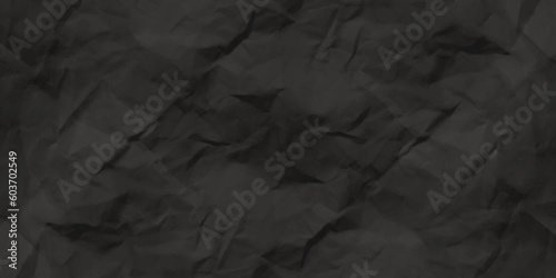 Black creased crumpled paper texture can be use as background. Ragged black Paper. black waxed packing paper texture. 