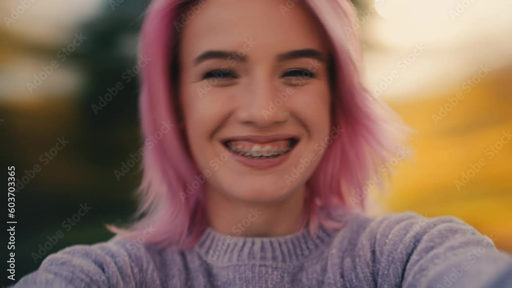 POV of pink-haired woman spinning around, feeling happiness and fun, youth POV of pink-haired woman spinning around, feeling happiness and fun, youth