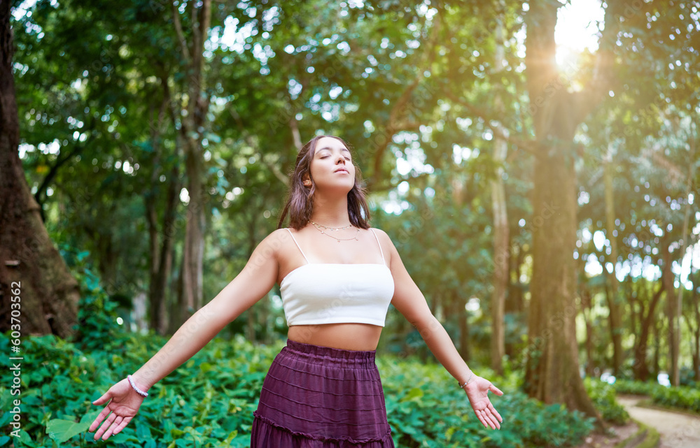 Brazilian young woman breathing fresh air with eyes closed in a park Brazilian young woman breathing fresh air with eyes closed in a park