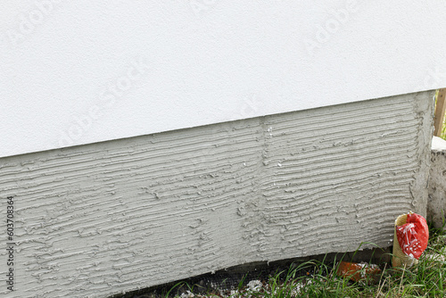 Photography Facade renovation, insulation with mineral wool and white plaster walls