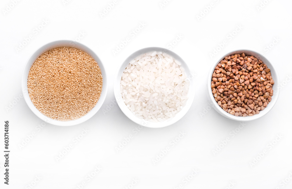 Rice, buckwheat, amaranth seeds. Gluten free seeds in bowls. Top view with copyspace. Rice, buckwheat, amaranth seeds. Gluten free seeds in bowls. Top view with copyspace.