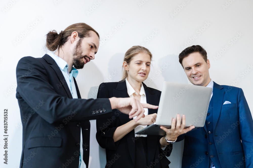 Group of business people using laptop brainstorming meeting teamwork. Effective people in organization use idea to consult their work. employees drive company. Group of business people using laptop brainstorming meeting teamwork. Effective people in organization use idea to consult their work. employees drive company.