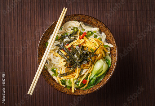 Special Chinese food chicken noodle soup on dark background