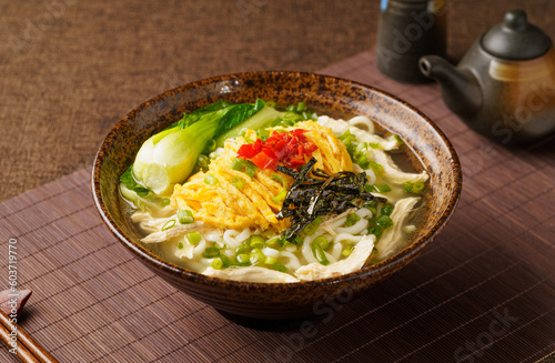 Special Chinese food chicken noodle soup on dark background