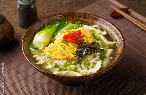 Special Chinese food chicken noodle soup on dark background