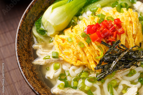 Special Chinese food chicken noodle soup on dark background