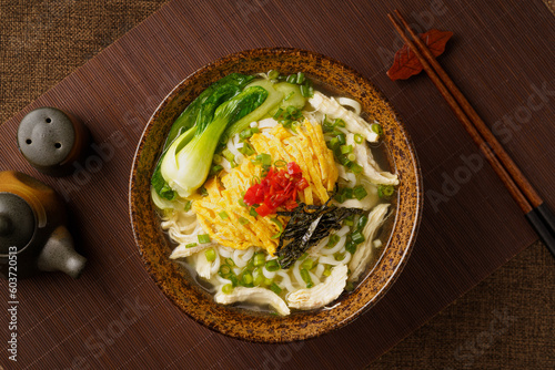 Special Chinese food chicken noodle soup on dark background