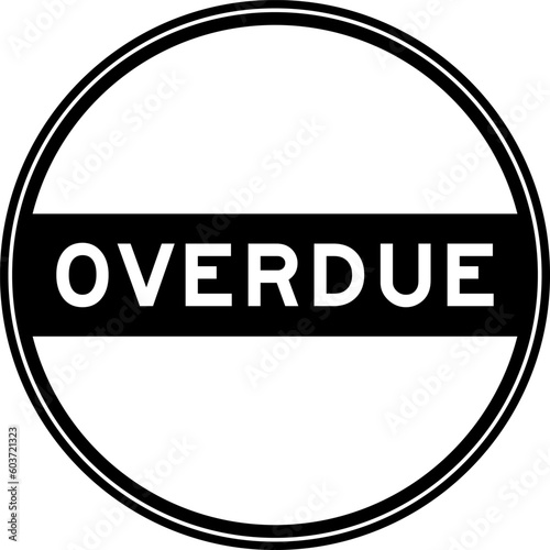 Black color round seal sticker in word overdue on white background