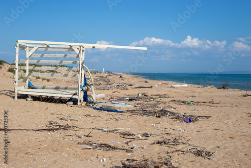 Photography Sandy beach with a lot of garbage on the shore