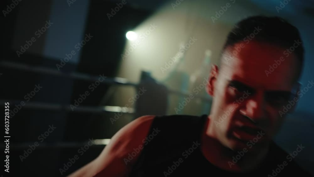 Boxer throws punches at the camera Boxer throws punches at the camera