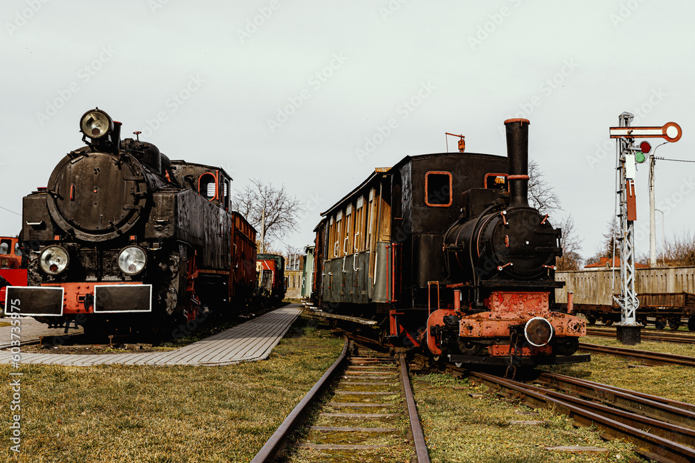 Classic steam engine at an open-air railway yard. Classic steam engine at an open-air railway yard.