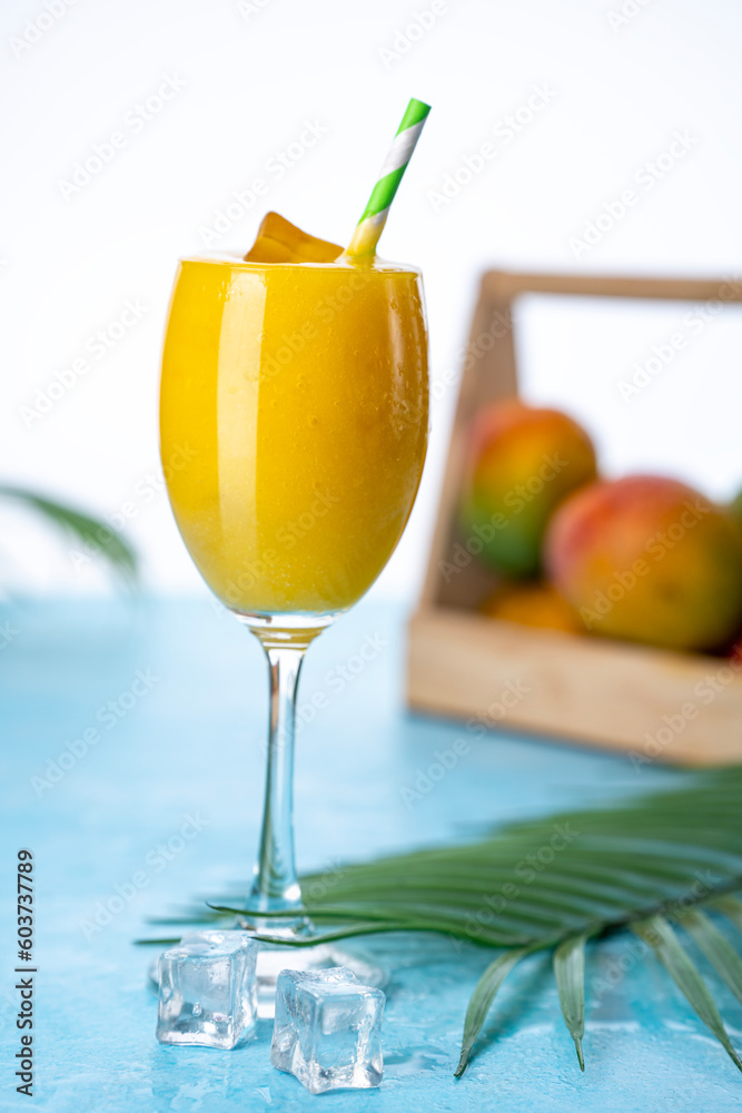 Mango juice with ice cubes, fresh and tasty mango juice image Mango juice with ice cubes, fresh and tasty mango juice image