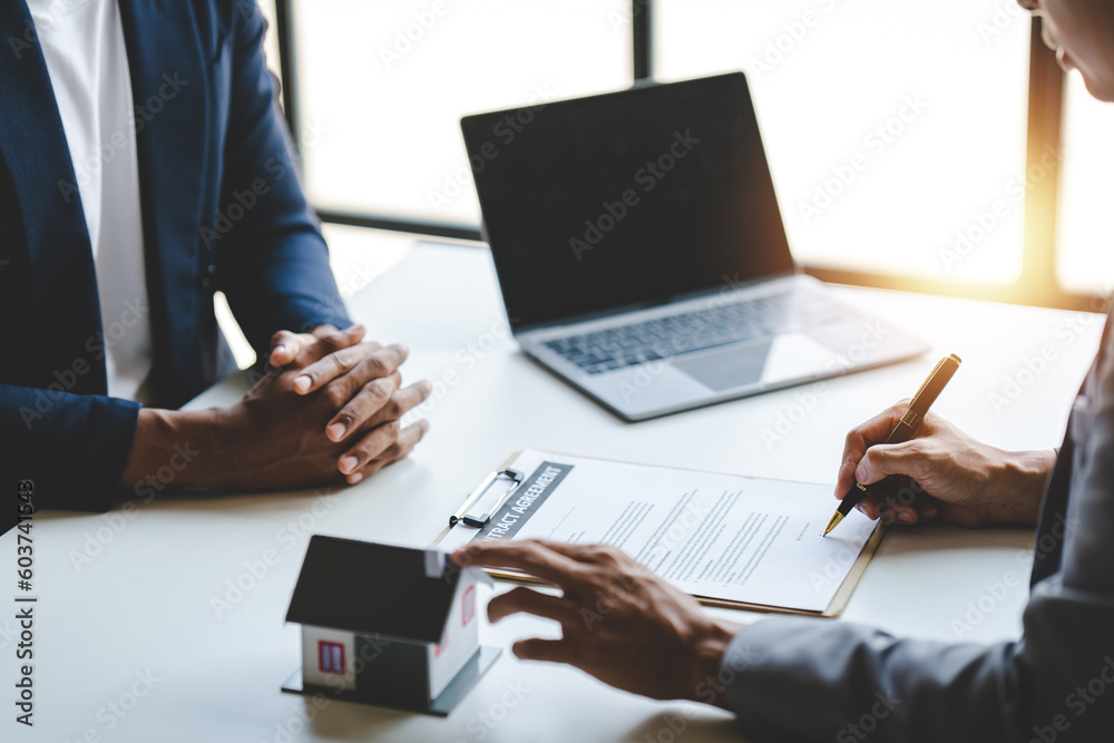 Real estate broker.Agents deliver sample houses to customers, mortgage contracts, loans, hire-purchase contracts and house sales. real estate concept Real estate broker.Agents deliver sample houses to customers, mortgage contracts, loans, hire-purchase contracts and house sales. real estate concept