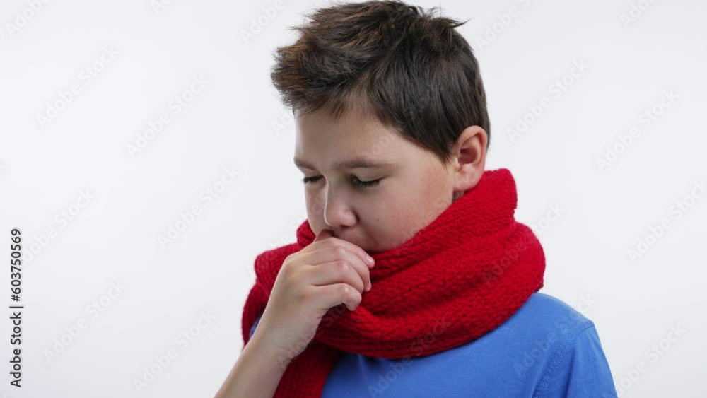 Coughing sick boy in scarf Coughing sick boy in scarf