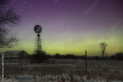northern lights behind old windmill