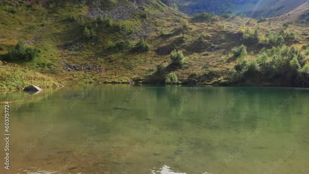 mountain lough with pure clear water in Arkhyz at summertime mountain lough with pure clear water in Arkhyz at summertime