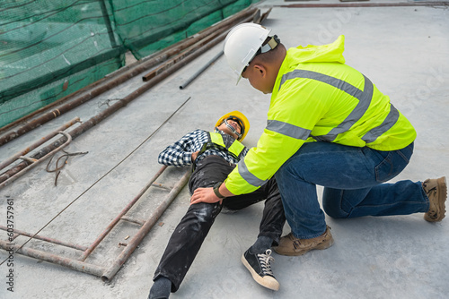 Photography Workers at construction sites fall from heights, fall from scaffolding, injure their hips