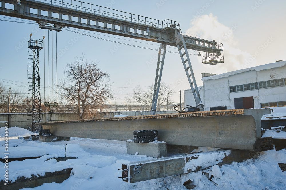 Foto de Row of reinforced concrete foundations with metal anchor bolts ...