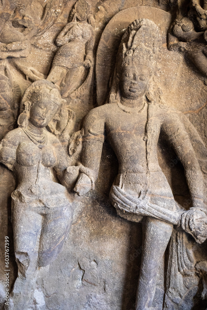 Sculpture of Shiva and Parvati marrying at the Elephanta Caves on Gharapuri island, outside of Mumbai, India