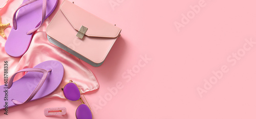 Stylish bag and beach accessories on pink background with space for text