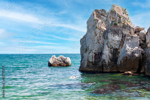 Fototapeta Naklejka Na Ścianę i Meble -  Crimea, Gurzuf - 5 July, 2015. A small rocky bay.