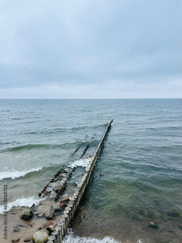 Cloudy gray seascape, sea coast, windy cloudy weather 