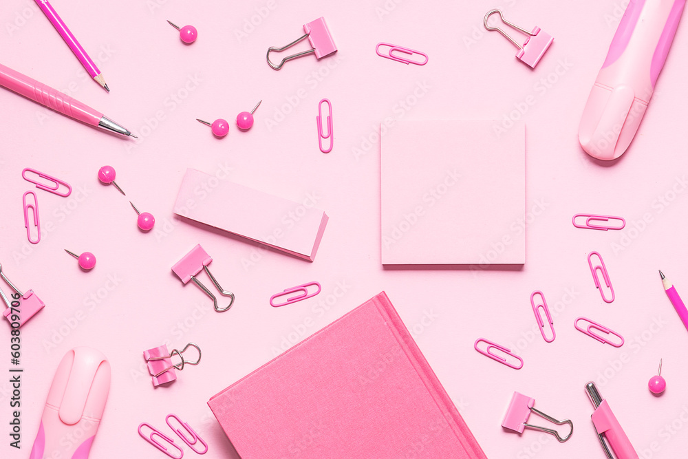 Pink stationery set on light pink background. Seamless pattern, top view. Back to school background. Creative office desktop. Pink stationery set on light pink background. Seamless pattern, top view. Back to school background. Creative office desktop.