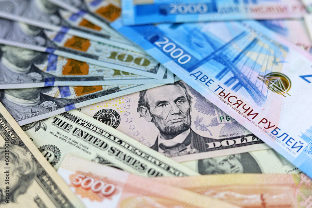 US dollars and russian rubles. Concept of exchange rate, american sanctions against Russia US dollars and russian rubles. Concept of exchange rate, american sanctions against Russia