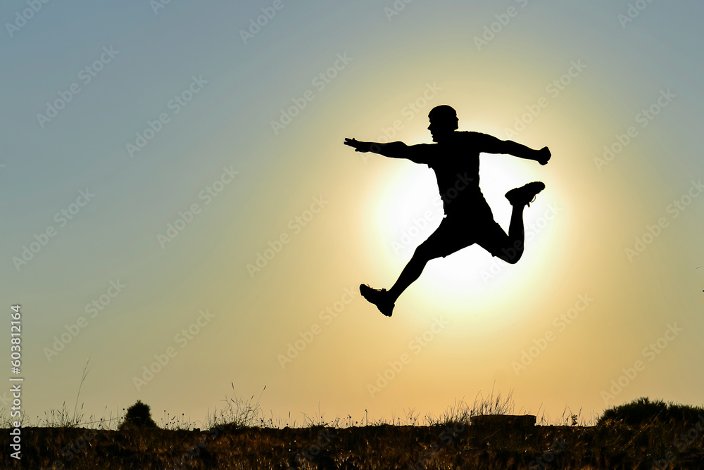 double headed creative jumping man silhouette double headed creative jumping man silhouette
