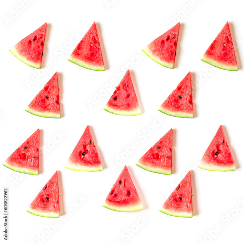 Juicy watermelon slices arranged in a pattern isolated on white background, top view