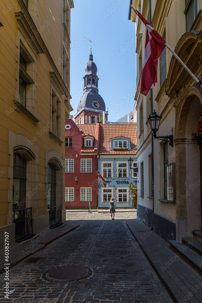 Riga old town Lativa Summer June 2023 photogenic streets with women girl in dress advertisment tourism