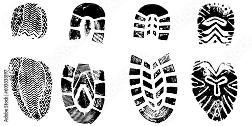 4 Isolated BootPrints - Highly detailed vector of walking shoes photo