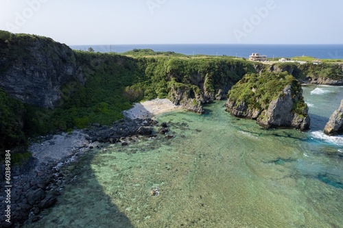 沖縄県国頭郡国頭村辺戸の辺戸岬、宇佐浜の海をドローンで空撮した風景 Aerial drone view of the sea at Cape Hendo and Usahama beach in Hendo, Kunigami-mura, Kunigami-gun, Okinawa, Japan  photo