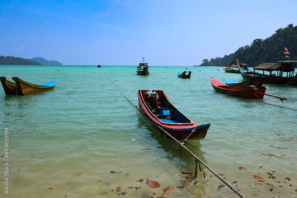 boats and island view of Surin island in Thailand