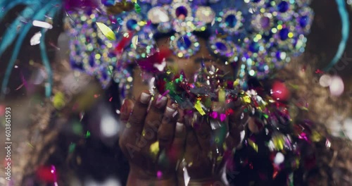 Woman, dancing and portrait with confetti and brazil at a carnival with glitter for culture in performance. Dancer, samba and festival for a social celebration of creativity with costume and makeup.