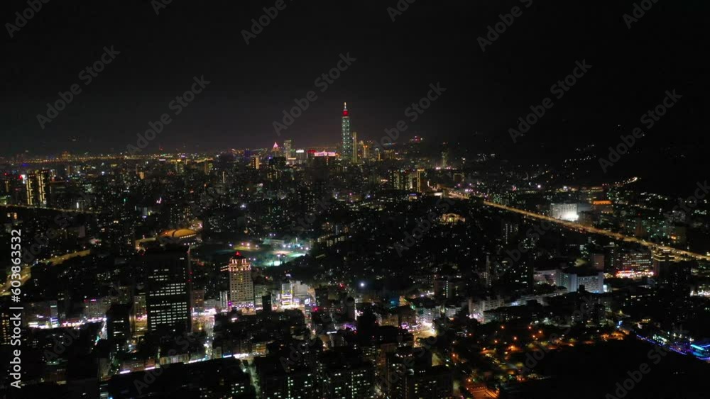 TAIWAN, TAIPEI - MAY, 2023: Aerial drone view of the busy traffic on city street at rush hour, night panorama. TAIWAN, TAIPEI - MAY, 2023: Aerial drone view of the busy traffic on city street at rush hour, night panorama.