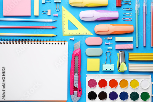 Different school stationery on light blue background, flat lay. Back to school