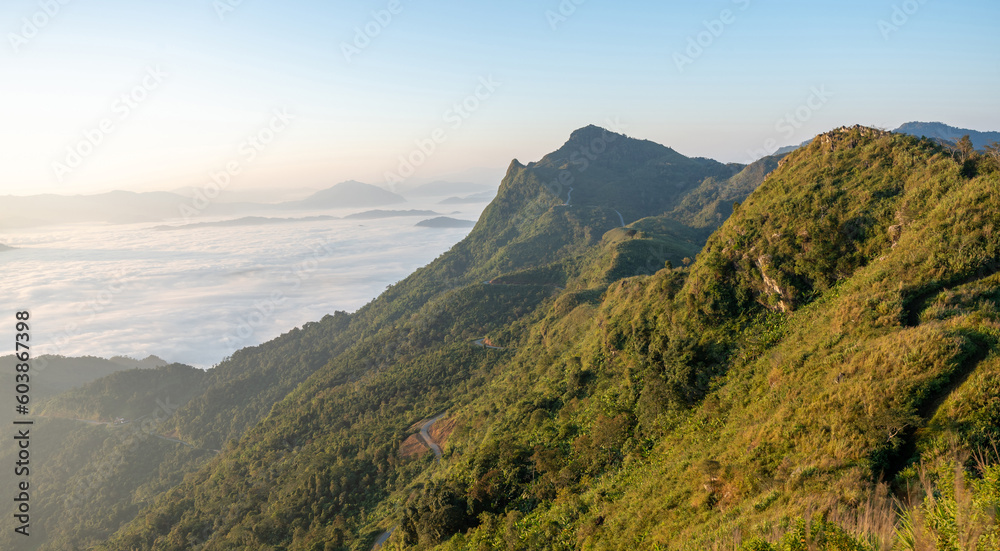 Beautiful landscape on the mountains at sunrise. Spectacular view in foggy valley covered forest under morning time. Beautiful landscape on the mountains at sunrise. Spectacular view in foggy valley covered forest under morning time.