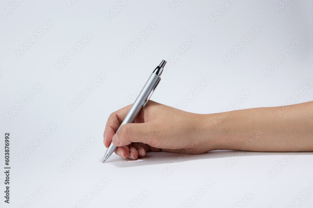 Hand holding a pen isolated on white background Hand holding a pen isolated on white background