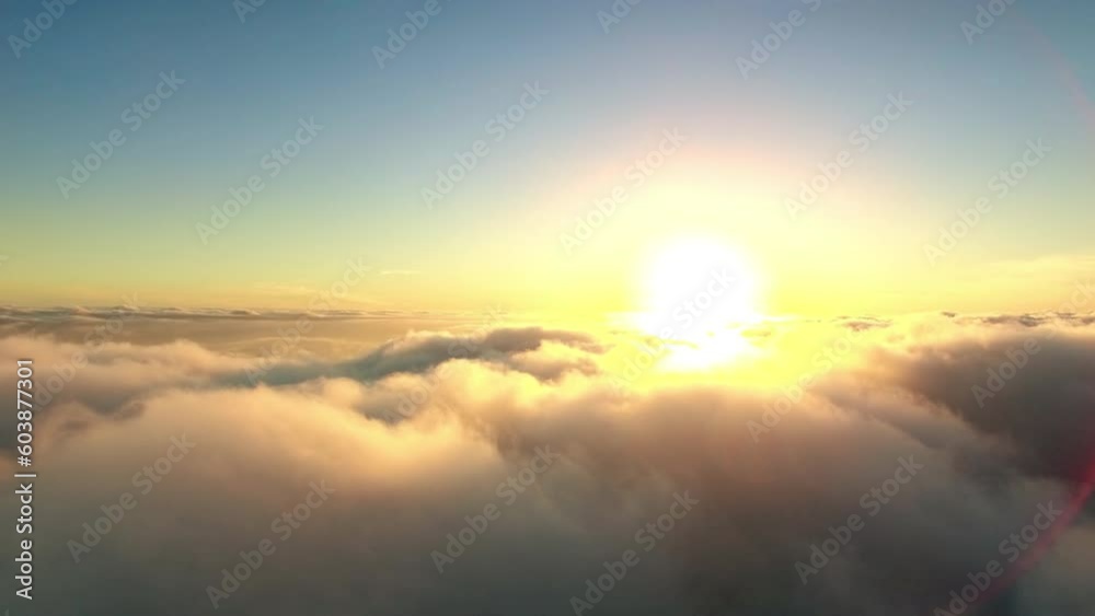 Clouds, drone and horizon of sunrise in blue sky for weather, nature and peaceful cloudscape. Heaven, earth and light with golden sunset and calm atmosphere for paradise, harmony and spirituality Clouds, drone and horizon of sunrise in blue sky for weather, nature and peaceful cloudscape. Heaven, earth and light with golden sunset and calm atmosphere for paradise, harmony and spirituality
