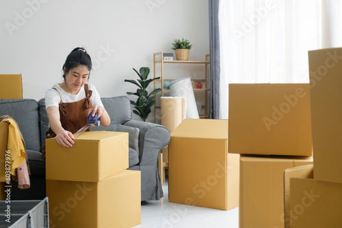 Modern female people in moving home apartment leisure indoor activity alone.