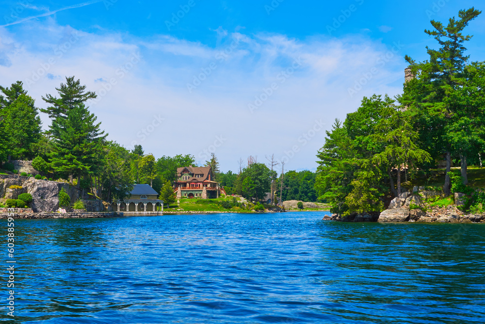 House on an island on the St. Lawrence River on a sunny day.Thousand Islands National Park. USA
