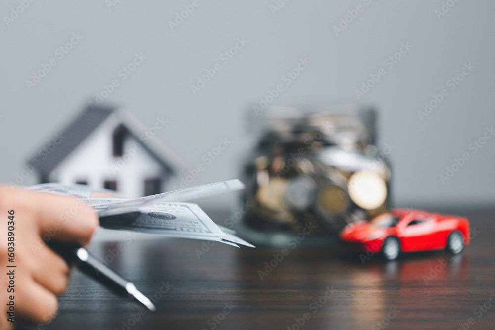 Car and House model. Concept of financial planning responsibility expenses and income. Asset approval concepts purchases to buy a car and a house. Ideas for home buying checklist home loan tax. Car and House model. Concept of financial planning responsibility expenses and income. Asset approval concepts purchases to buy a car and a house. Ideas for home buying checklist home loan tax.