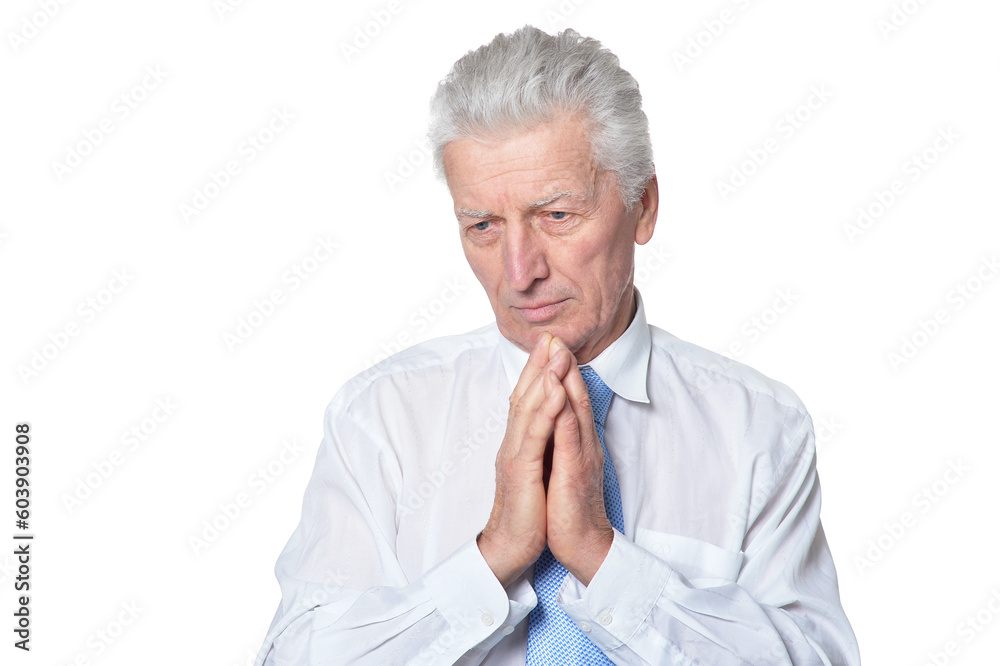close up portrait of senior businessman in formal wear praying isolated close up portrait of senior businessman in formal wear praying isolated