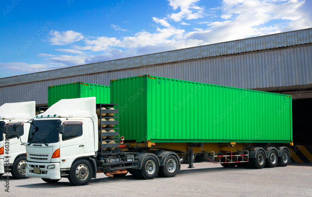 Semi Trailer Trucks on The Parking Lot. Trucks Loading at Dock Warehouse. Shipping Cargo Container Delivery Trucks. Distribution Warehouse, Freight Trucks Logistic, Cargo Transport. Semi Trailer Trucks on The Parking Lot. Trucks Loading at Dock Warehouse. Shipping Cargo Container Delivery Trucks. Distribution Warehouse, Freight Trucks Logistic, Cargo Transport.
