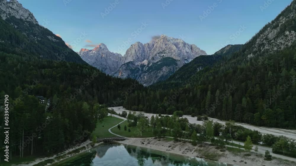 Aerial, Lake Jasna overlooking Julian Alps in Kranjska Gora, Slovenia Aerial, Lake Jasna overlooking Julian Alps in Kranjska Gora, Slovenia