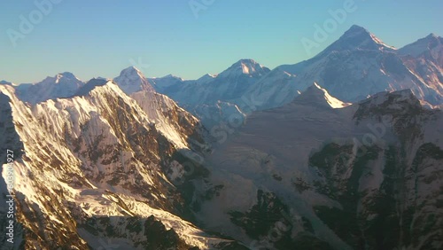 Cinematic scenic flight Mt Everest Lost Himalayas mountain range Nepal Kathmandu Buddha Air sunrise on tallest mountain peaks in the world National Geographic seven wonders of nature from the air photo