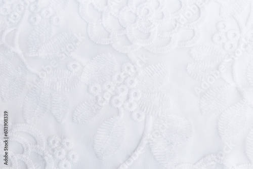 White fabric with flower pattern background, design fabric pattern