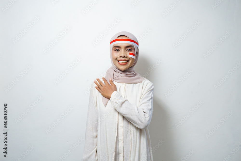 Portrait of Young Asian Muslim Women celebrate Indonesian independence day isolated on white background Portrait of Young Asian Muslim Women celebrate Indonesian independence day isolated on white background