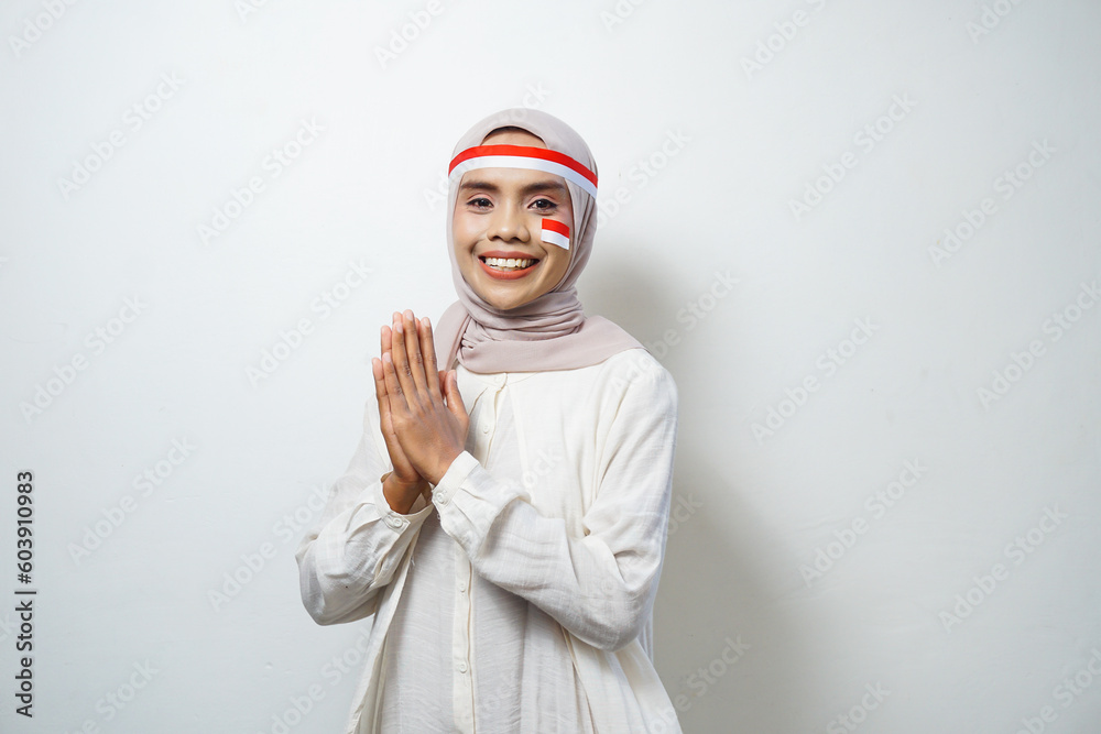 Portrait of Young Asian Muslim Women celebrate Indonesian independence day isolated on white background